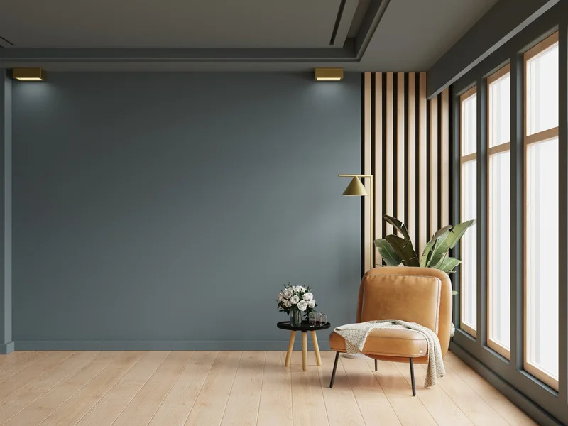 Interior painting with dark grey accent wall and wood trim paneling Interior painting with dark grey accent wall and wood trim paneling