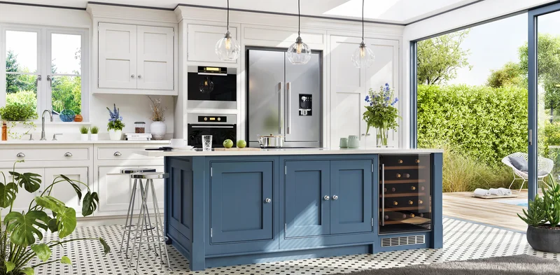 White kitchen remodel featuring a large blue island with wine fridge